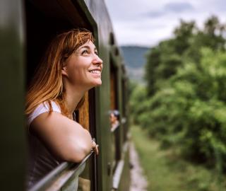 Girl looking out of train